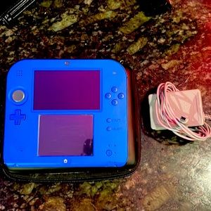 Nintendo 2ds Blue, modded with pre downloaded games and software.